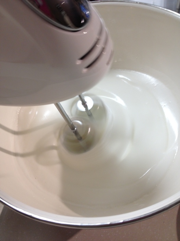 Meringue texture is very glossy and can form stiff peaks when you lift the beaters.